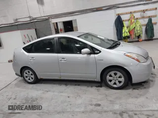 2007 Toyota Prius z VIN JTDKB20U977649489, wystawiony jako IAAI lot #41772600 z przebiegiem 248 525 mil mil oraz . Historia ofert i sprzedaży dostępna na DreamBid. Obrazek 13.
