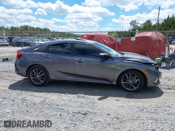 2021 Honda Civic Sedan EX with VIN 19XFC1F33ME012262, listed as a IAAI auction lot 41880047 with 67,861 mi miles. Bid and sale history available at carsss.com. Image 13.