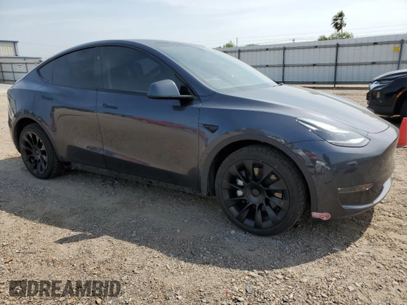 2024 Tesla Model Y Long Range z VIN 7SAYGDEE3RA234223, wystawiony jako Copart lot #51784185 z przebiegiem 24 257 mil mil oraz Szkoda całkowita • Salvage title. Historia ofert i sprzedaży dostępna na DreamBid. Obrazek 4.