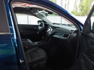 2021 Chevrolet Equinox LT z VIN 3GNAXKEVXML350994, wystawiony jako IAAI lot #42201733 z przebiegiem 31 429 mil mil oraz . Historia ofert i sprzedaży dostępna na DreamBid. Obrazek 5.