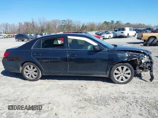 2005 Toyota Avalon XL with VIN 4T1BK36B25U012191, listed as a IAAI auction lot 38785162 with 230,071 mi miles and . Bid and sale history available at carsss.com. Image 13.