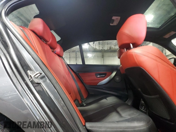 2014 BMW 3 Series 335i xDrive with VIN WBA3B9C59EP458568, listed as a Copart auction lot 61133085 with 177,009 mi miles and Salvage title. Bid and sale history available at DreamBid. Image 10.