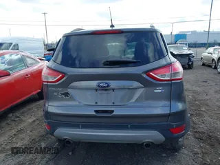 2014 Ford Escape SE with VIN 1FMCU9GX3EUB26129, listed as a IAAI auction lot 41987470 with 139,005 mi miles. Bid and sale history available at carsss.com. Image 16.
