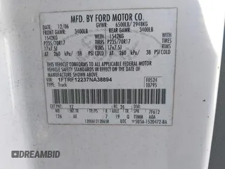 2007 Ford F-150 XL with VIN 1FTRF12237NA38894, listed as a IAAI auction lot 41834362 with 392,011 mi miles. Bid and sale history available at carsss.com. Image 9.