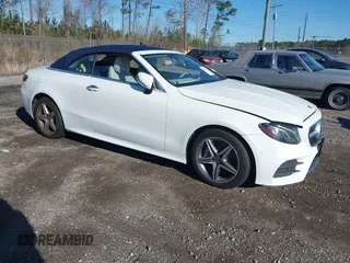 2018 Mercedes-Benz E 400 z VIN WDD1K6GBXJF031138, wystawiony jako IAAI lot #41704112 z przebiegiem 51 133 mil mil oraz . Historia ofert i sprzedaży dostępna na DreamBid. Obrazek 1.