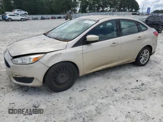 2018 Ford Focus SE z VIN 1FADP3FE1JL203499, wystawiony jako Copart lot #65052135 z przebiegiem 97 161 mil mil oraz Czysty tytuł • Clean title. Historia ofert i sprzedaży dostępna na DreamBid. Obrazek 1.