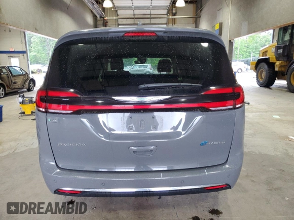 2021 Chrysler Pacifica Hybrid Touring L with VIN 2C4RC1L72MR596429, listed as a Copart auction lot 53859345 with 97,218 mi miles and Salvage title. Bid and sale history available at DreamBid. Image 6.