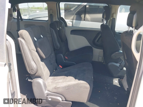 2015 Dodge Grand Caravan SE with VIN 2C4RDGBG9FR691462, listed as a IAAI auction lot 42197050 with 124,239 mi miles and . Bid and sale history available at DreamBid. Image 8.