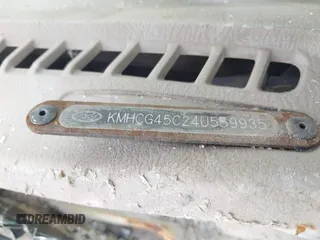 2004 Hyundai Accent GL z VIN KMHCG45C24U559935, wystawiony jako IAAI lot #40487927 z przebiegiem Nie podano mil oraz . Historia ofert i sprzedaży dostępna na DreamBid. Obrazek 12.