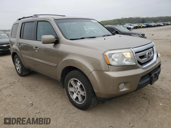 2011 Honda Pilot Touring with VIN 5FNYF4H99BB097019, listed as a Copart auction lot 53865365 with 260,357 mi miles and Salvage Title. Bid and sale history available at DreamBid. Image 4.