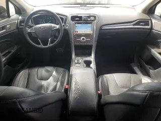 2017 Ford Fusion Titanium with VIN 3FA6P0SU7HR354444, listed as a Copart auction lot 50601035 with 159,069 mi miles and Salvage Title. Bid and sale history available at DreamBid. Image 8.