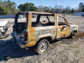 1986 Ford Bronco z VIN 1FMCU14TXGUD18203, wystawiony jako Copart lot #47194155 z przebiegiem Nie podano mil oraz Czysty tytuł • Clean title. Historia ofert i sprzedaży dostępna na DreamBid. Obrazek 3.