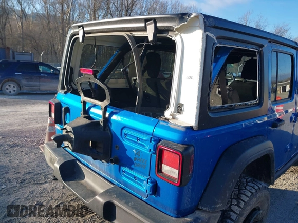 2021 Jeep Wrangler Unlimited Sport S with VIN 1C4HJXDN4MW779291, listed as a IAAI auction lot 41290109 with 43,379 mi miles and . Bid and sale history available at DreamBid. Image 6.