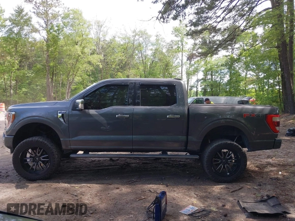 2021 Ford F-150 XL with VIN 1FTFW1E87MFC59701, listed as a IAAI auction lot 42288926 with Not provided miles and . Bid and sale history available at DreamBid. Image 14.