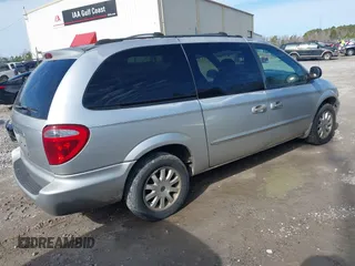 2003 Chrysler Town & Country LX with VIN 2C4GP44L03R203678, listed as a IAAI auction lot 41293296 with 210,827 mi miles and . Bid and sale history available at DreamBid. Image 4.