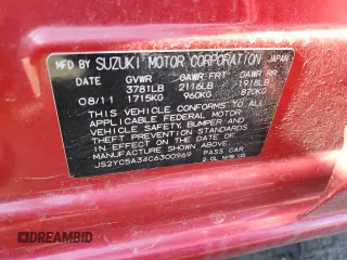 2012 Suzuki SX4 LE z VIN JS2YC5A34C6300969, wystawiony jako Copart lot #49036095 z przebiegiem 163 367 mil mil oraz Szkoda całkowita • Salvage title. Historia ofert i sprzedaży dostępna na DreamBid. Obrazek 12.