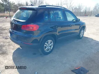 2017 Volkswagen Tiguan S with VIN WVGAV7AX6HK016922, listed as a IAAI auction lot 42032319 with 104,358 mi miles and . Bid and sale history available at DreamBid. Image 4.
