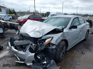 2017 Nissan Altima 2.5 SR with VIN 1N4AL3AP1HC263607, listed as a IAAI auction lot 41953565 with 105,459 mi miles. Bid and sale history available at carsss.com. Image 2.