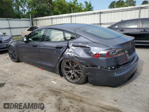 2022 Tesla Model S with VIN 5YJSA1E5XNF471212, listed as a Copart auction lot 57384025 with Not provided miles and Salvage title. Bid and sale history available at DreamBid. Image 2.