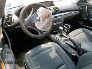 2009 BMW 1 Series 128i z VIN WBAUP73559VK76443, wystawiony jako Copart lot #58270455 z przebiegiem 151 731 mil mil oraz Szkoda całkowita • Salvage title. Historia ofert i sprzedaży dostępna na DreamBid. Obrazek 8.