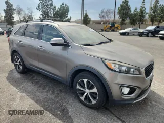 2016 Kia Sorento EX with VIN 5XYPH4A54GG094512, listed as a Copart auction lot 64965125 with 162,565 mi miles and Salvage title. Bid and sale history available at DreamBid. Image 4.