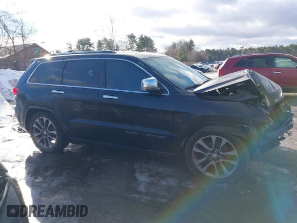 2017 Jeep Grand Cherokee Overland with VIN 1C4RJFCG8HC835645, listed as a IAAI auction lot 41442765 with 95,324 mi miles and . Bid and sale history available at DreamBid. Image 14.