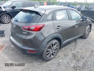 2017 Mazda CX-3 Touring z VIN JM1DKFC79H0162745, wystawiony jako IAAI lot #42318637 z przebiegiem 68 465 mil mil oraz . Historia ofert i sprzedaży dostępna na DreamBid. Obrazek 4.