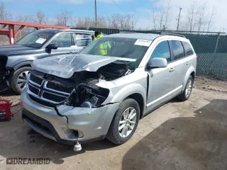 2013 Dodge Journey SXT with VIN 3C4PDCBG9DT611684, listed as a IAAI auction lot 41880584 with 111,304 mi miles. Bid and sale history available at carsss.com. Image 2.