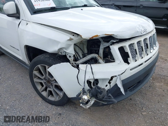 2014 Jeep Compass Limited with VIN 1C4NJDCB6ED684897, listed as a IAAI auction lot 41920568 with 175,196 mi miles. Bid and sale history available at carsss.com. Image 6.