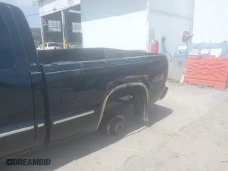 2002 Chevrolet Silverado 1500 LT with VIN 2GCEK19T721199574, listed as a IAAI auction lot 42074373 with 319,080 mi miles. Bid and sale history available at carsss.com. Image 6.