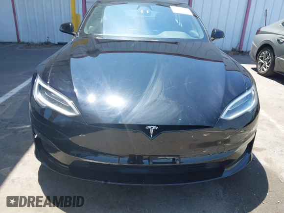 2021 Tesla Model S Long Range z VIN 5YJSA1E54MF429360, wystawiony jako IAAI lot #42662440 z przebiegiem 36 395 mil mil oraz . Historia ofert i sprzedaży dostępna na DreamBid. Obrazek 12.
