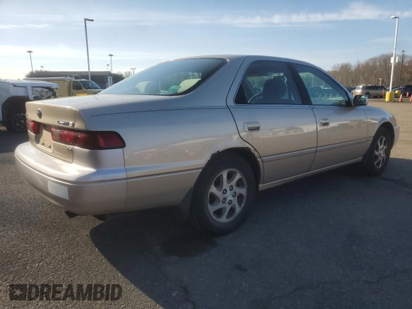 1999 Toyota Camry LE z VIN JT2BF22K4X0199123, wystawiony jako Copart lot #53456665 z przebiegiem 181 526 mil mil oraz Szkoda całkowita • Salvage title. Historia ofert i sprzedaży dostępna na DreamBid. Obrazek 3.