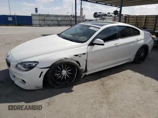 2015 BMW 6 Series 640i with VIN WBA6A0C59FGB53555, listed as a Copart auction lot 67128254 with 99,503 mi miles and Salvage Title. Bid and sale history available at DreamBid. Image 1.
