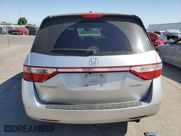 2011 Honda Odyssey Touring с VIN 5FNRL5H92BB063040, выставлен на аукционе Copart как лот 58551765 с пробегом 236 526 миль миль и Списание • Salvage title. История ставок и продаж доступна на DreamBid. Изображение 6.