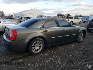 2009 Chrysler 300 z VIN 2C3LA43D49H637017, wystawiony jako Copart lot #86786114 z przebiegiem 157 691 mil mil oraz Czysty tytuł • Clean title. Historia ofert i sprzedaży dostępna na DreamBid. Obrazek 3.