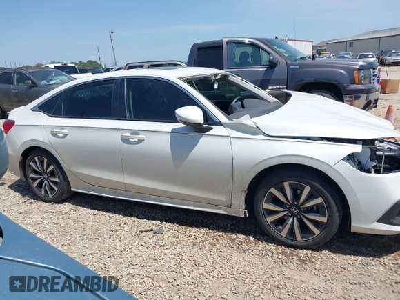 2023 Honda Civic EX with VIN 2HGFE1F76PH324177, listed as a IAAI auction lot 42253724 with 26,950 mi miles and . Bid and sale history available at DreamBid. Image 14.