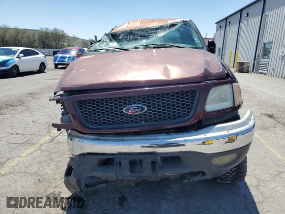 2001 Ford F-150 XLT with VIN 1FTRW08L31KE43205, listed as a Copart auction lot 56141495 with Not provided miles and Non repairable. Bid and sale history available at DreamBid. Image 5.