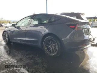 2023 Tesla Model 3 with VIN 5YJ3E1EA0PF449499, listed as a Copart auction lot 52900515 with 42,706 mi miles and Non Repairable. Bid and sale history available at DreamBid. Image 2.