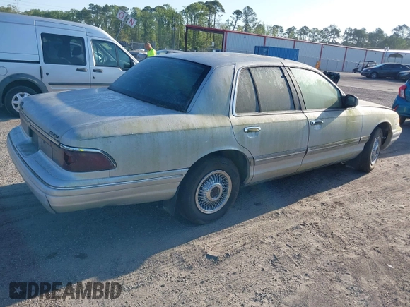 1997 Mercury Grand Marquis GS z VIN 2MELM74W6VX625065, wystawiony jako IAAI lot #42055672 z przebiegiem 125 494 mil mil oraz . Historia ofert i sprzedaży dostępna na DreamBid. Obrazek 4.