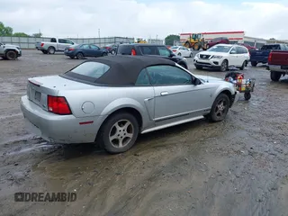 2001 Ford Mustang Deluxe z VIN 1FAFP44461F132453, wystawiony jako IAAI lot #42243068 z przebiegiem 183 171 mil mil oraz . Historia ofert i sprzedaży dostępna na DreamBid. Obrazek 4.