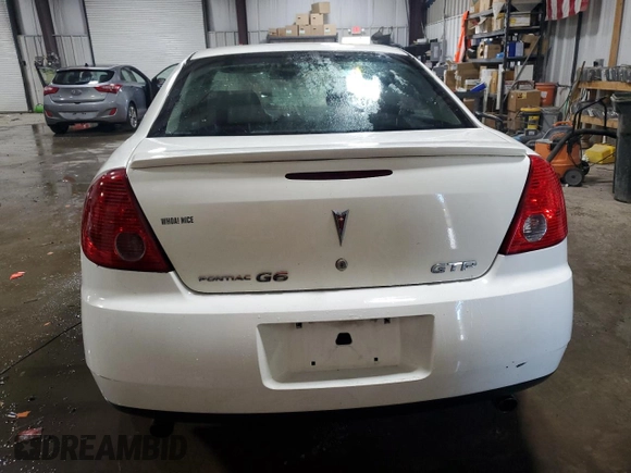 2006 Pontiac G6 GTP z VIN 1G2ZM551X64245937, wystawiony jako Copart lot #72382884 z przebiegiem Nie podano mil oraz Szkoda całkowita • Salvage title. Historia ofert i sprzedaży dostępna na DreamBid. Obrazek 6.