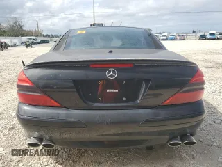 2006 Mercedes-Benz SL 500 z VIN WDBSK75F16F111203, wystawiony jako Copart lot #56429385 z przebiegiem Nie podano mil oraz Szkody całkowita. Historia ofert i sprzedaży dostępna na DreamBid. Obrazek 6.