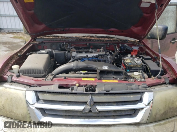 2002 Mitsubishi Montero XLS z VIN JA4MW31R52J069014, wystawiony jako Copart lot #71785804 z przebiegiem Nie podano mil oraz Czysty tytuł • Clean title. Historia ofert i sprzedaży dostępna na DreamBid. Obrazek 12.