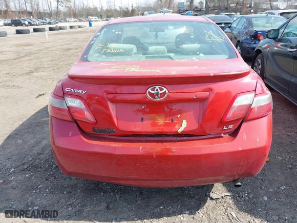 2007 Toyota Camry CE with VIN 4T1BE46K57U087077, listed as a IAAI auction lot 41727602 with 999,999 mi miles. Bid and sale history available at carsss.com. Image 6.
