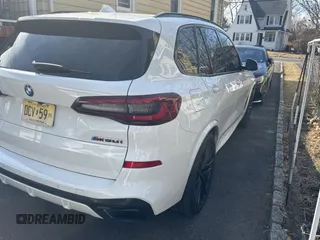2021 BMW X5 M50i with VIN 5UXJU4C09M9H07838, listed as a Copart auction lot 47020525 with 57,200 mi miles and Clean Title. Bid and sale history available at carsss.com. Image 4.