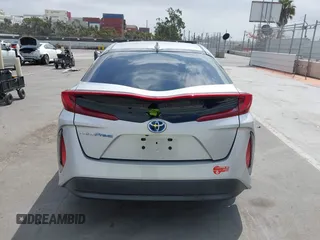 2017 Toyota Prius Plus z VIN JTDKARFPXH3053894, wystawiony jako IAAI lot #42208119 z przebiegiem 115 439 mil mil oraz . Historia ofert i sprzedaży dostępna na DreamBid. Obrazek 16.