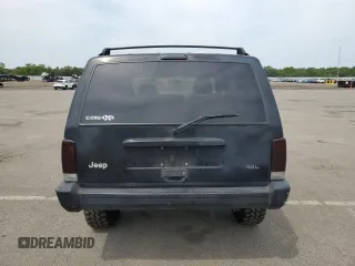 1999 Jeep Cherokee Sport with VIN 1J4FF68S9XL635836, listed as a Copart auction lot 59573195 with 187,035 mi miles and Salvage title. Bid and sale history available at DreamBid. Image 6.