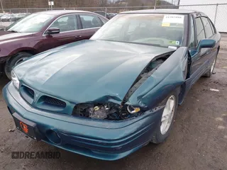 1996 Pontiac Bonneville z VIN 1G2HZ5210TH210829, wystawiony jako IAAI lot #41203888 z przebiegiem 154 990 mil mil oraz . Historia ofert i sprzedaży dostępna na DreamBid. Obrazek 6.