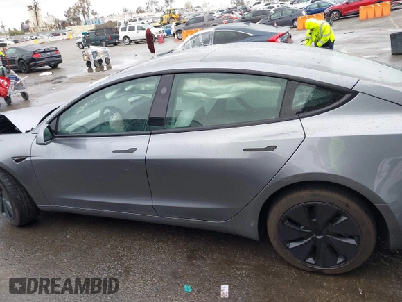 2025 Tesla Model 3 Long Range with VIN 5YJ3E1EA2SF885408, listed as a IAAI auction lot 41778498 with 1,566 mi miles and . Bid and sale history available at DreamBid. Image 14.