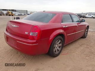 2010 Chrysler 300 Touring with VIN 2C3CA5CV3AH138812, listed as a IAAI auction lot 41870285 with 165,788 mi miles. Bid and sale history available at carsss.com. Image 4.